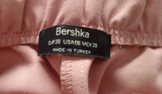 Pantalón corto con sobrefalda rosa