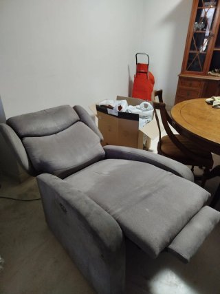 Sofá reclinable gris de tela