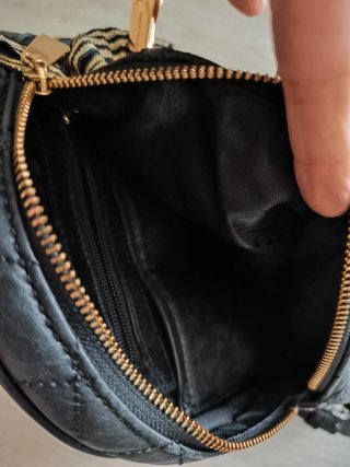 Mochila Michael Kors Negra y Dorada