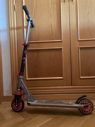 Patinete Oxelo rosa y gris