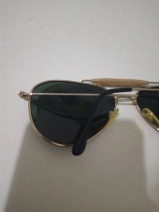 Gafas de sol aviador doradas y cristales verdes