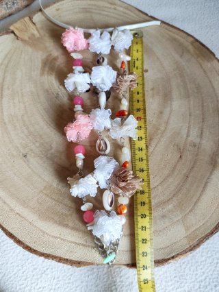 Conjunto de pulseras conchas y flores