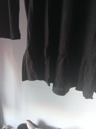 Maglia nera con colletto gioiello