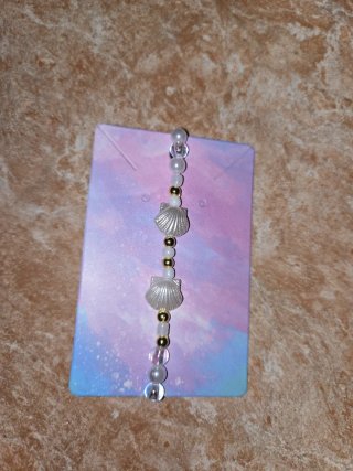 Pulsera conchas y perlas doradas