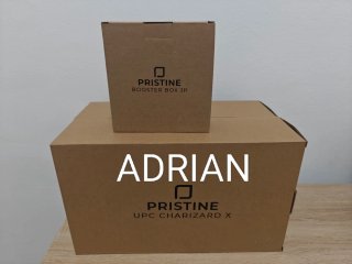 2 Acrílicos UPC + 1 Booster Box JP para Adrian