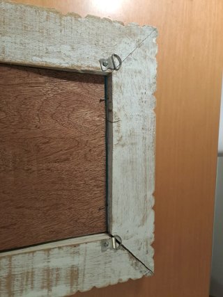 Mirall de paret amb fusta tallada Espejo de pared
