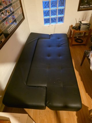 Sofá-cama de piel negro