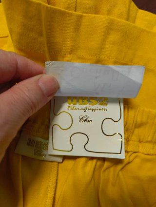 Falda pantalón de niña color mostaza con lazo