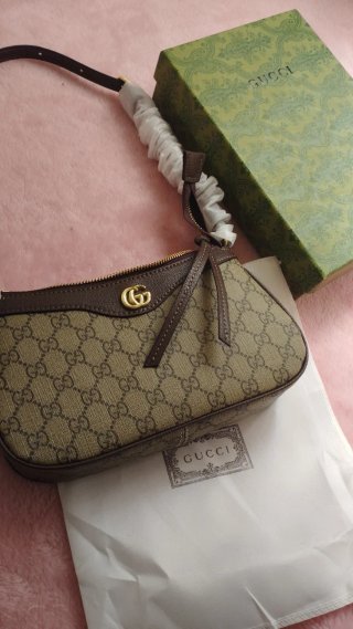 Bolso estilo icónico beige y marrón