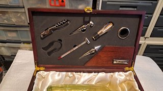 Trousse per vino con serratura dorata