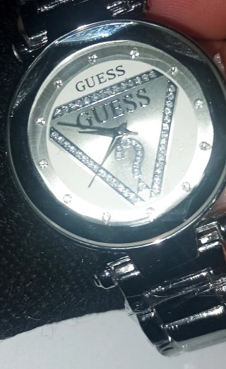 Reloj Guess plateado y blanco