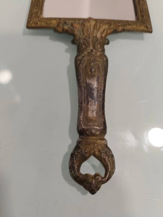 Espejo antiguo de mano de metal