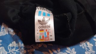 Chaqueta Adidas Negra con Rayas Blancas