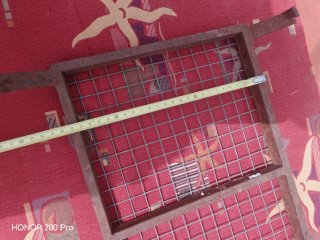 Rejilla metálica con marco de hierro