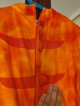 Disfraz de dinosaurio naranja