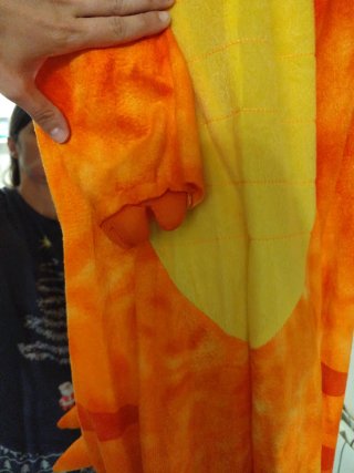 Disfraz de dinosaurio naranja