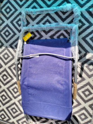 Tumbona plegable azul. Nuevas, sin estrenar.