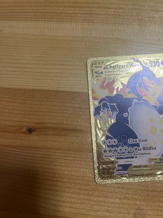 Charizard VMAX Carta Pokémon Dorada