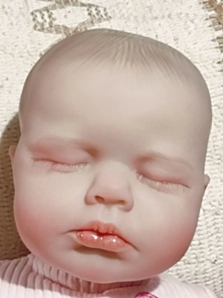 -Muñeca Reborn Vinilo 50 cm Cuerpo de tela.
