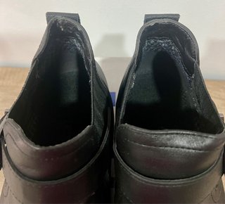 Botines de piel negros con hebilla