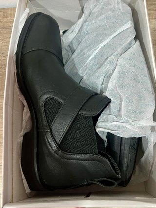 Botines de piel negros con hebilla