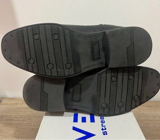 Botines de piel negros con hebilla