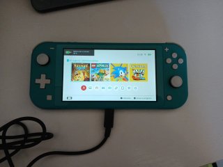 Pacchetto Nintendo Switch Lite + 4 Giochi + Accessori