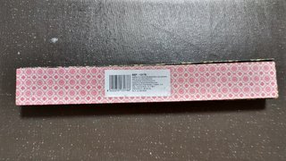 Abanico de madera calada con borla