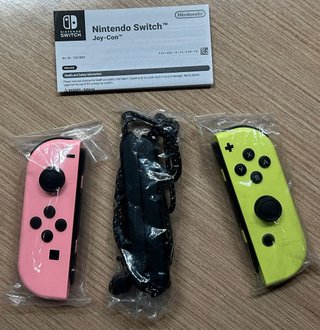 Oficial Joy-Con Nintendo Switch Ed. Rosa/Amarillo