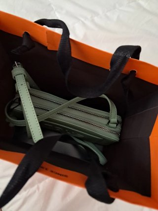 Bolso Tous bandolera verde claro.