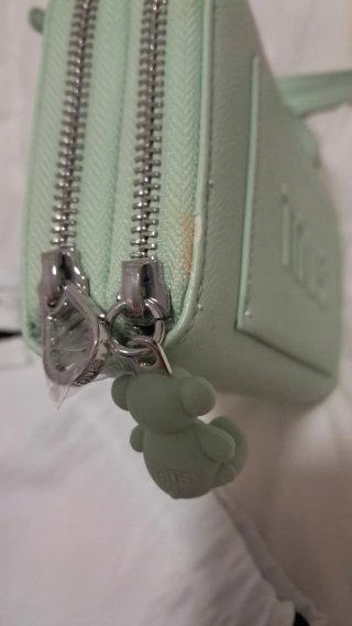 Bolso Tous bandolera verde claro.