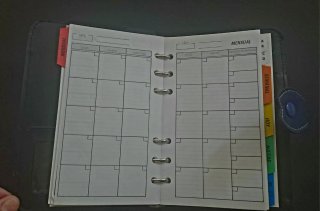 Agenda personal azul con diseño escocés