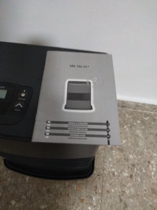 Estufa de parafina negra y gris