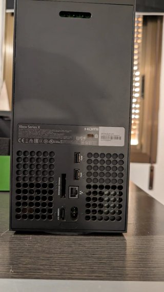 Xbox series X perfecto estado, lector funciona