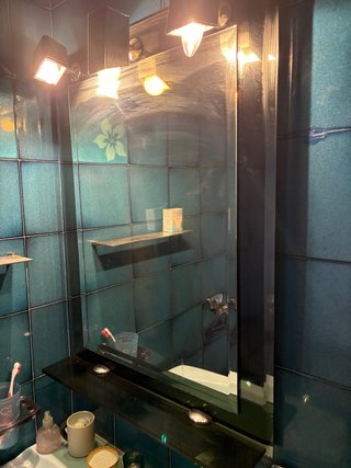 Espejo de baño con iluminación focos