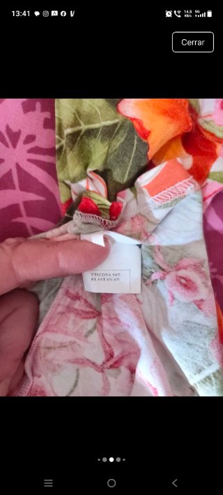 Top floral entallado tonos naranja y rosa