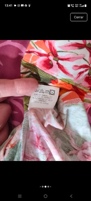 Top floral entallado tonos naranja y rosa