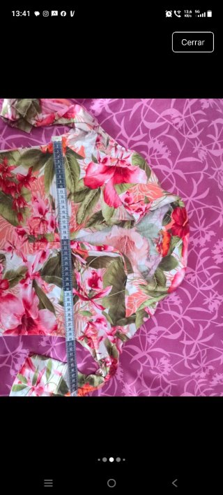 Top floral entallado tonos naranja y rosa