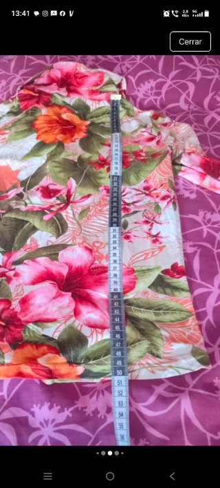 Top floral entallado tonos naranja y rosa