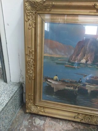 Quadro con cornice dorata