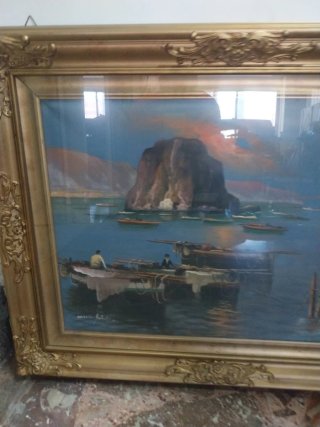 Quadro con cornice dorata
