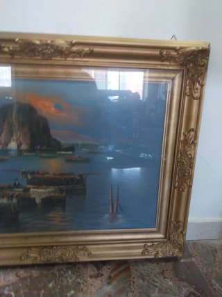 Quadro con cornice dorata