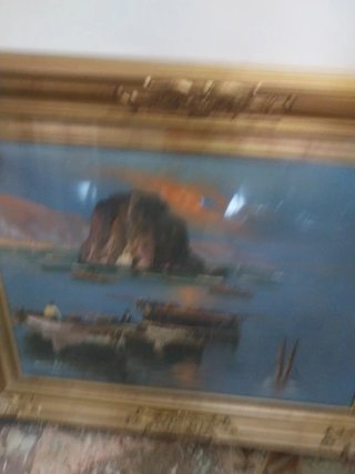 Quadro con cornice dorata