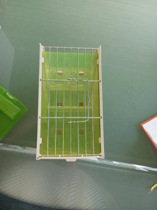 Transportín para aves verde y blanco