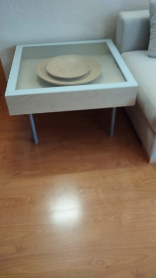 Mesa de centro cristal y madera.