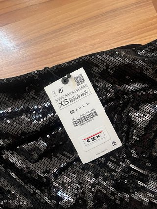 Falda Zara lentejuelas y plumas Talla XS