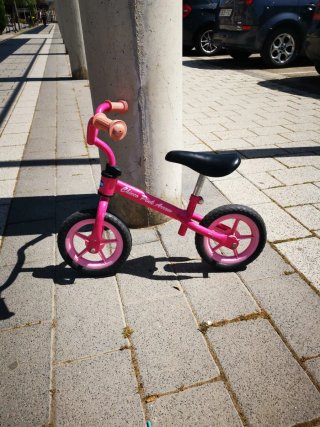 Bici de aprendizaje rosa para niña