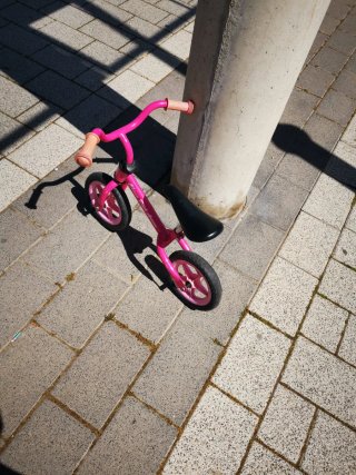 Bici de aprendizaje rosa para niña