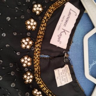 Blusa elegante ricamata organza nera e oro