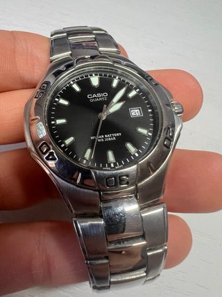 Reloj Casio Quartz Negro y Plateado